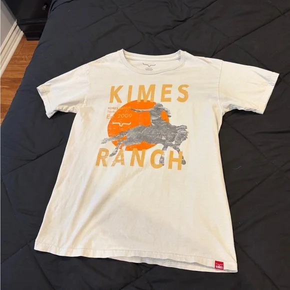 Kimes Ranch White Tee with Orange & Gray Rodeo Graphic - Picture 1 of 2